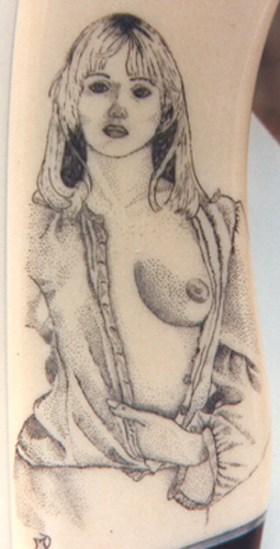 Scrimshaw By Mary blck and white scrimshaw of a       nude